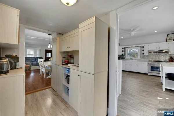 a room with toys and a wooden floor