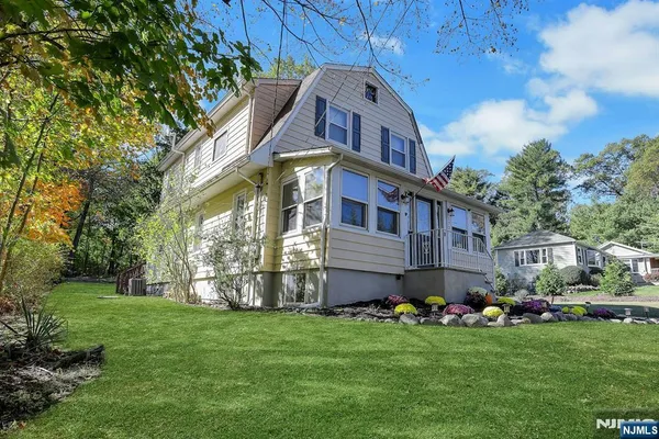 a front view of house with yard