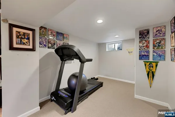 a view of a patio with table and chairs