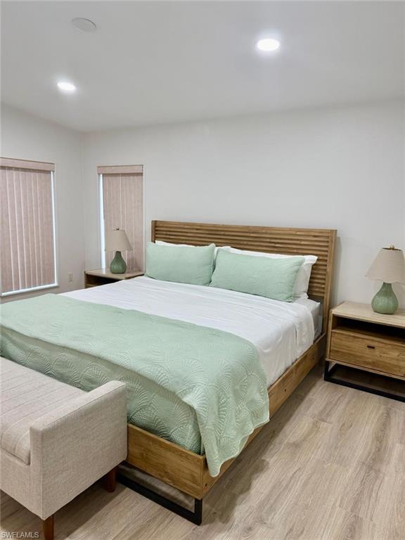 27579 Big Bend Road Bonita Springs, FL 34134 - Photo 2 of 9 a bedroom with a bed and window