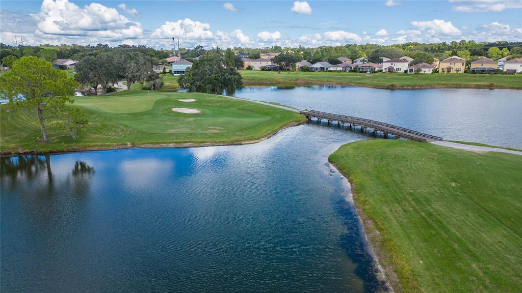 7018 Cascade Court Lakeland, FL 33813 - Photo 21 of 31 a view of a lake with houses in the back