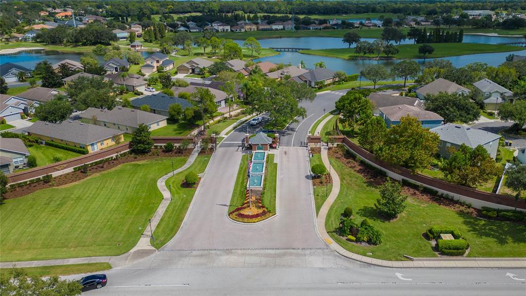 7018 Cascade Court Lakeland, FL 33813 - Photo 22 of 31 an aerial view of a house with a lake view