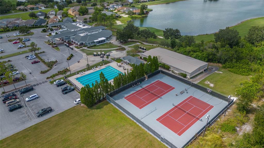 7018 Cascade Court Lakeland, FL 33813 - Photo 24 of 31 an aerial view of a pool patio outdoor seating and yard