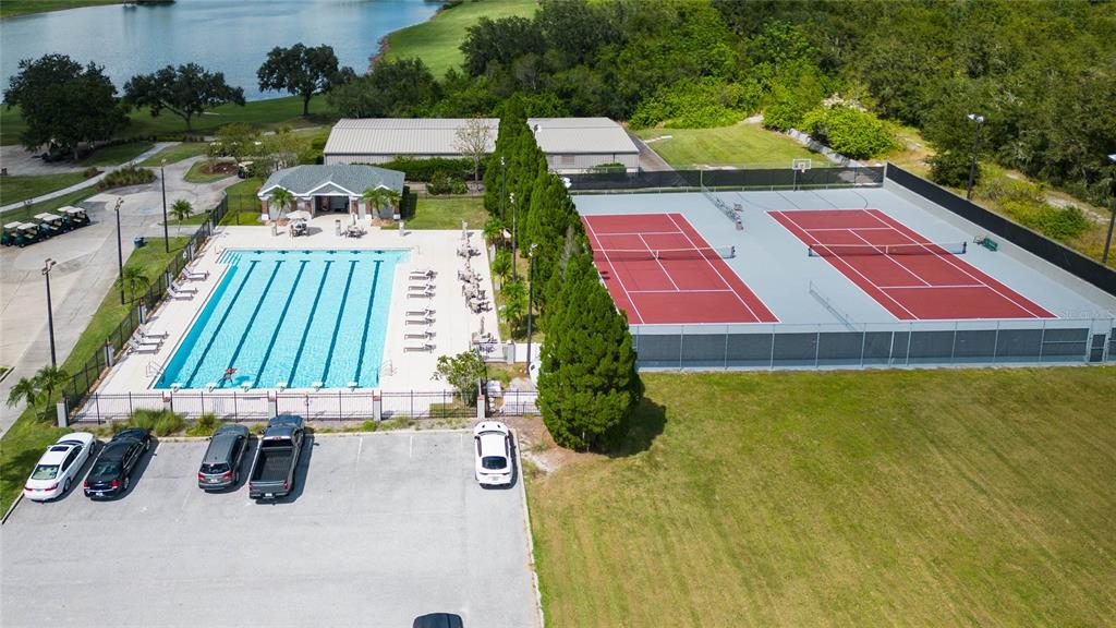 7018 Cascade Court Lakeland, FL 33813 - Photo 25 of 31 an aerial view of a house with swimming pool garden and patio