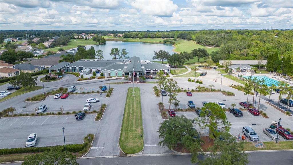 7018 Cascade Court Lakeland, FL 33813 - Photo 26 of 31 an aerial view of a city with lots of residential buildings ocean and mountain view in back