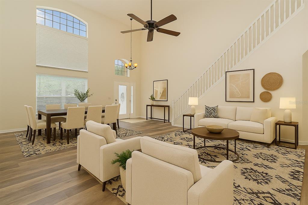 7018 Cascade Court Lakeland, FL 33813 - Photo 6 of 31 a living room with furniture and wooden floor