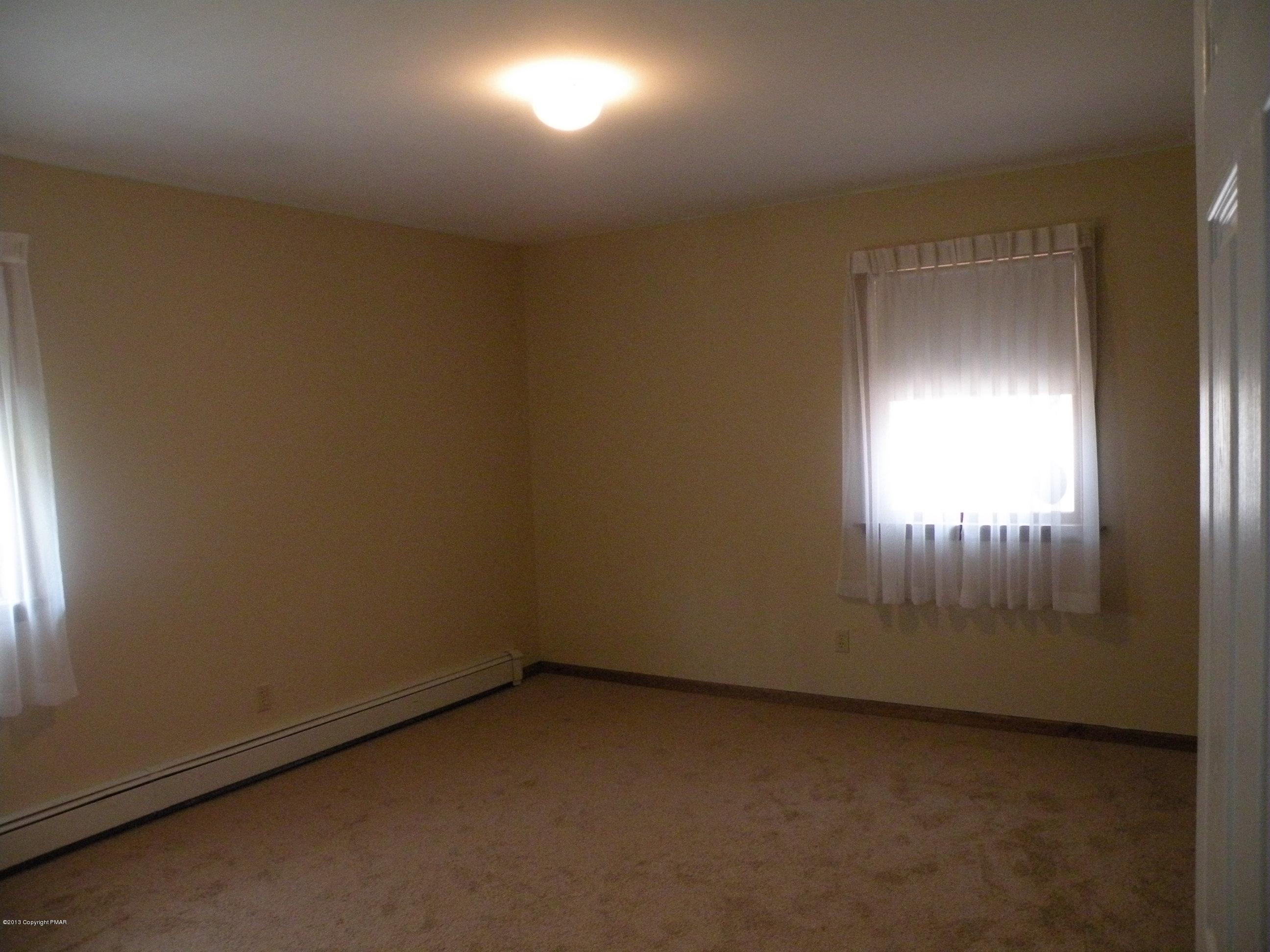 335 Pin Oak Road Stroudsburg, PA 18360 - Photo 11 of 21 an empty room with windows