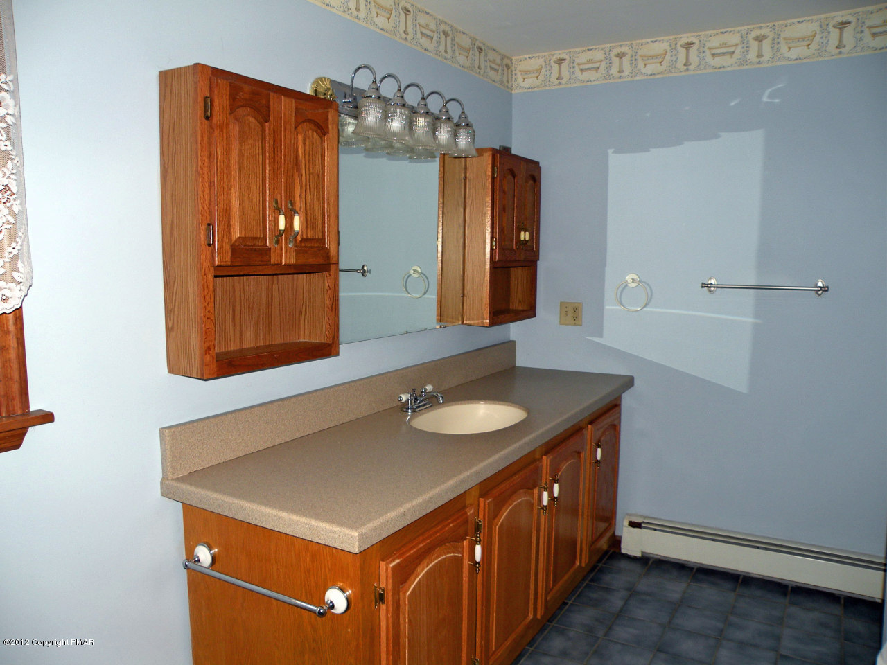 335 Pin Oak Road Stroudsburg, PA 18360 - Photo 14 of 21 a bathroom with a sink and a mirror