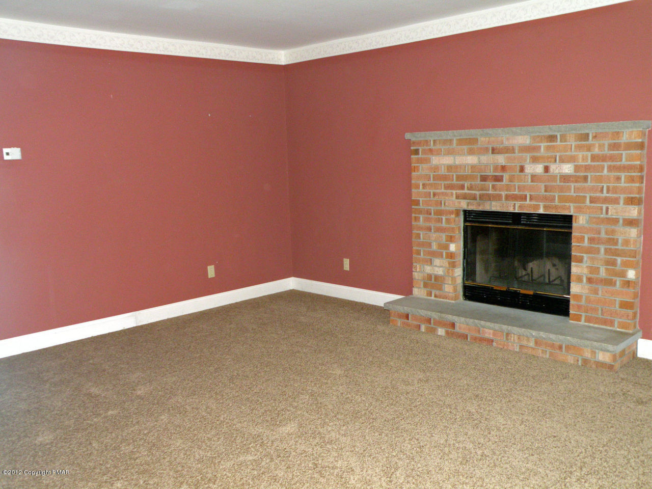 335 Pin Oak Road Stroudsburg, PA 18360 - Photo 5 of 21 a view of empty room with a fireplace