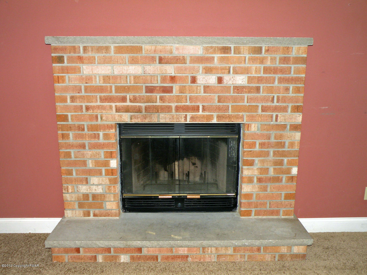 335 Pin Oak Road Stroudsburg, PA 18360 - Photo 6 of 21 a living room with a fireplace