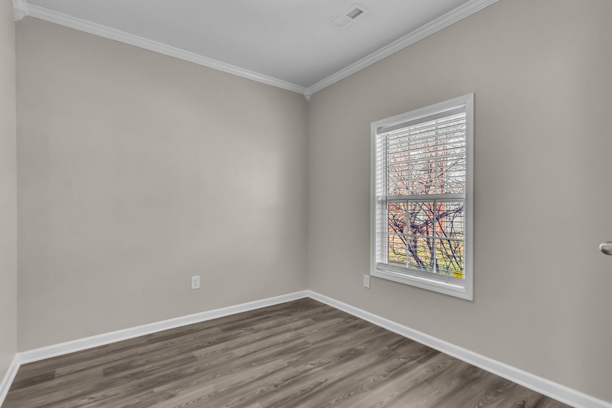 3008 Michael Lane Spring Hill, TN 37174 - Photo 13 of 33 an empty room with wooden floor and windows