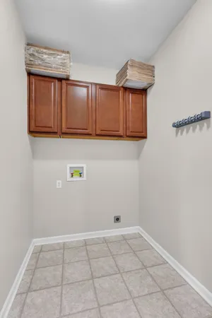 a view of an empty room and wooden floor