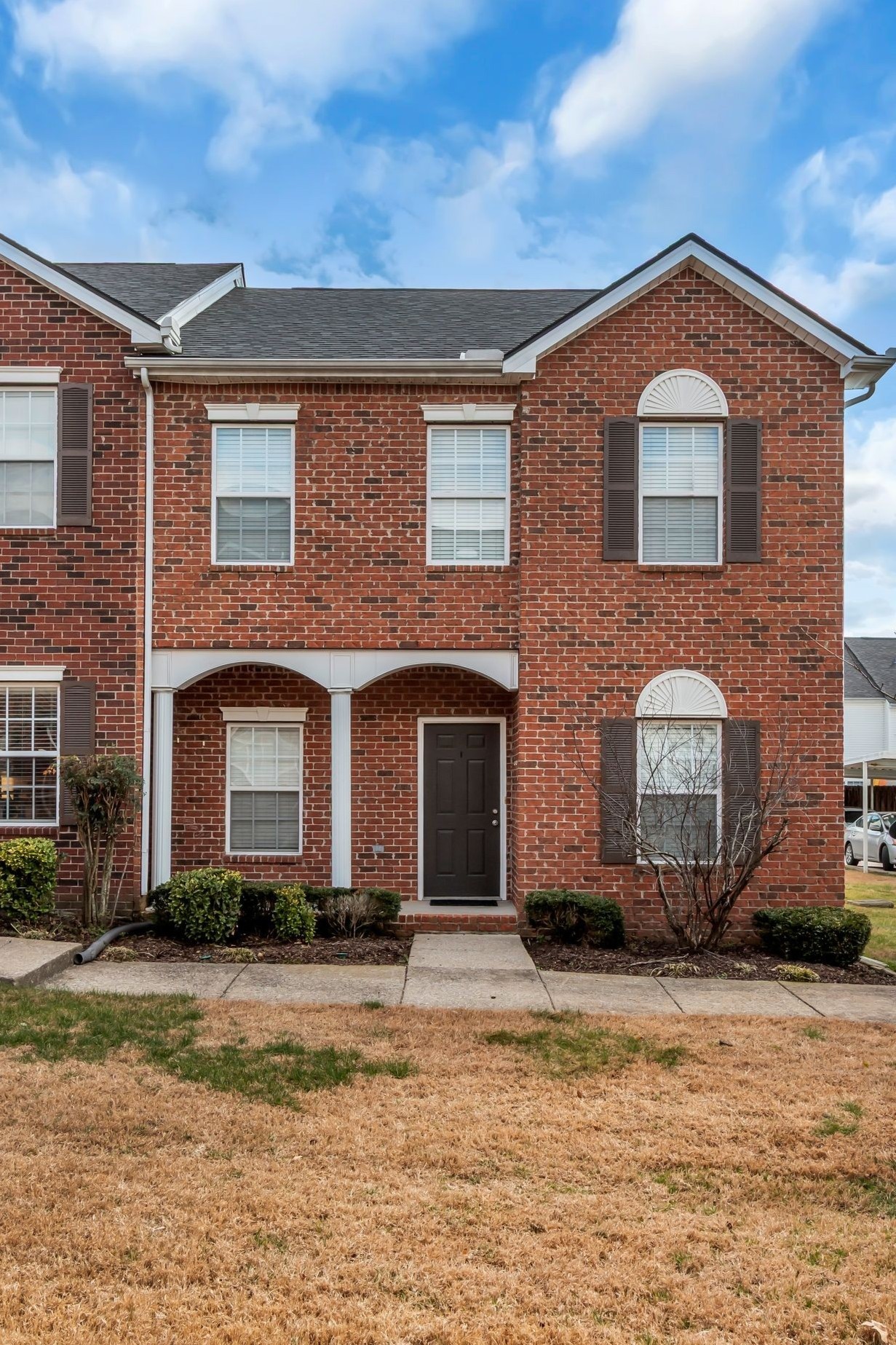 3008 Michael Lane Spring Hill, TN 37174 - Photo 2 of 33 a front view of a house with a yard