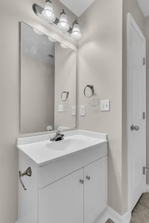 a sink with a mirror