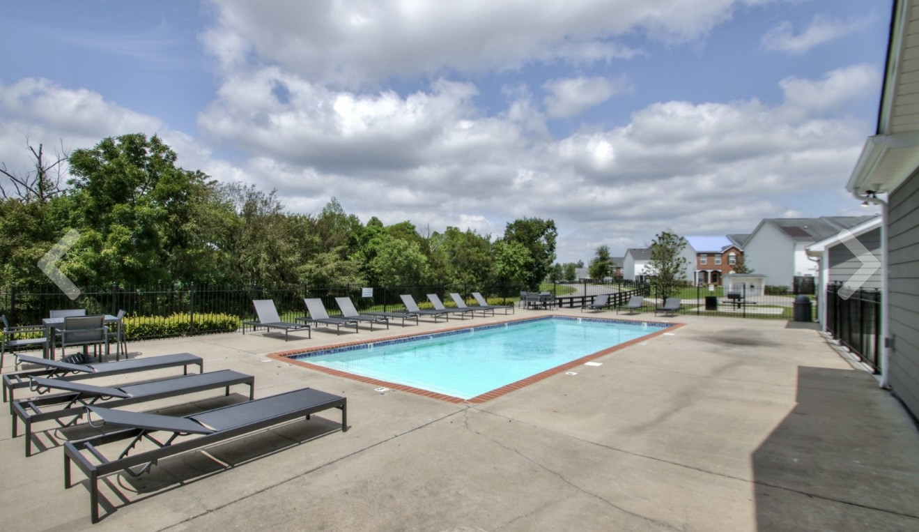 3008 Michael Lane Spring Hill, TN 37174 - Photo 32 of 33 a view of a swimming pool with lounge chairs in patio