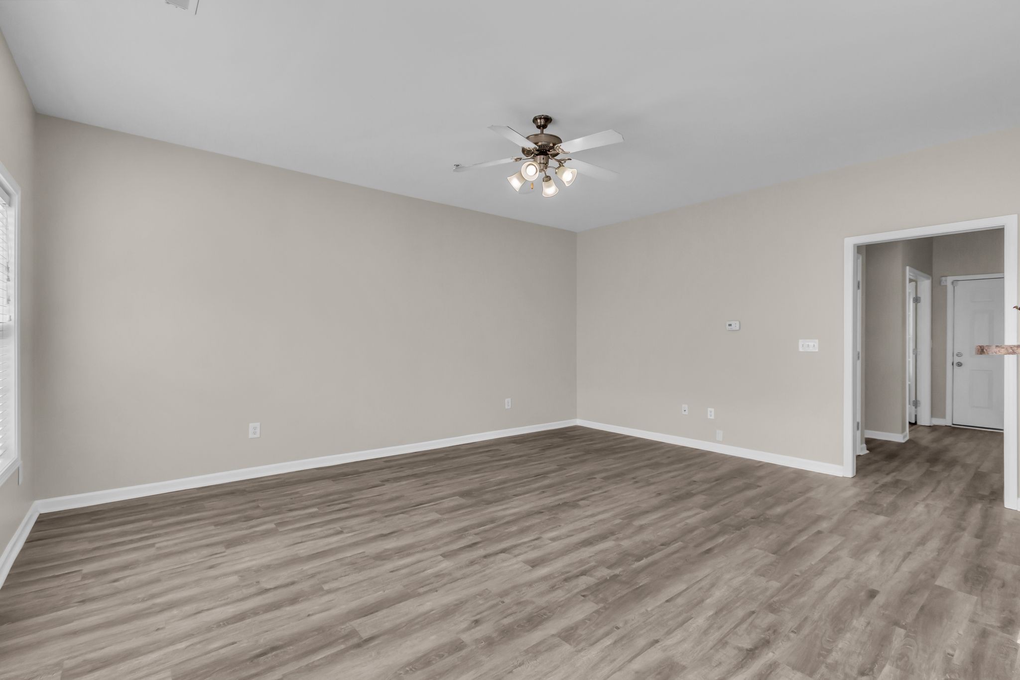 3008 Michael Lane Spring Hill, TN 37174 - Photo 5 of 33 a view of an empty room with wooden floor