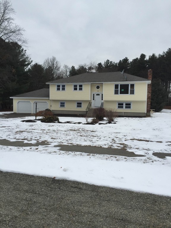 22 Winsor Road Billerica, MA 01821 - Photo 1 of 9 a front view of house with yard