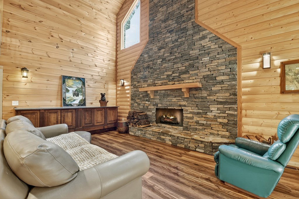 523 Long Branch Road Ranger, GA 30734 - Photo 24 of 56 a living room with furniture and a fireplace