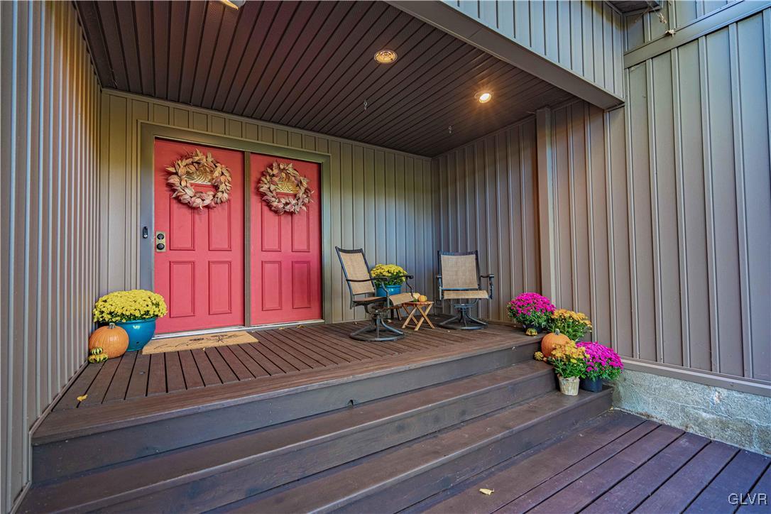 110 Mountain Park Road Allentown, PA 18103 - Photo 4 of 22 a view of a porch with furniture and wooden floor