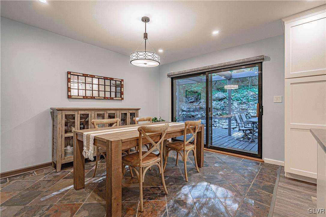 110 Mountain Park Road Allentown, PA 18103 - Photo 8 of 22 a view of a dining room with furniture wooden floor and chandelier