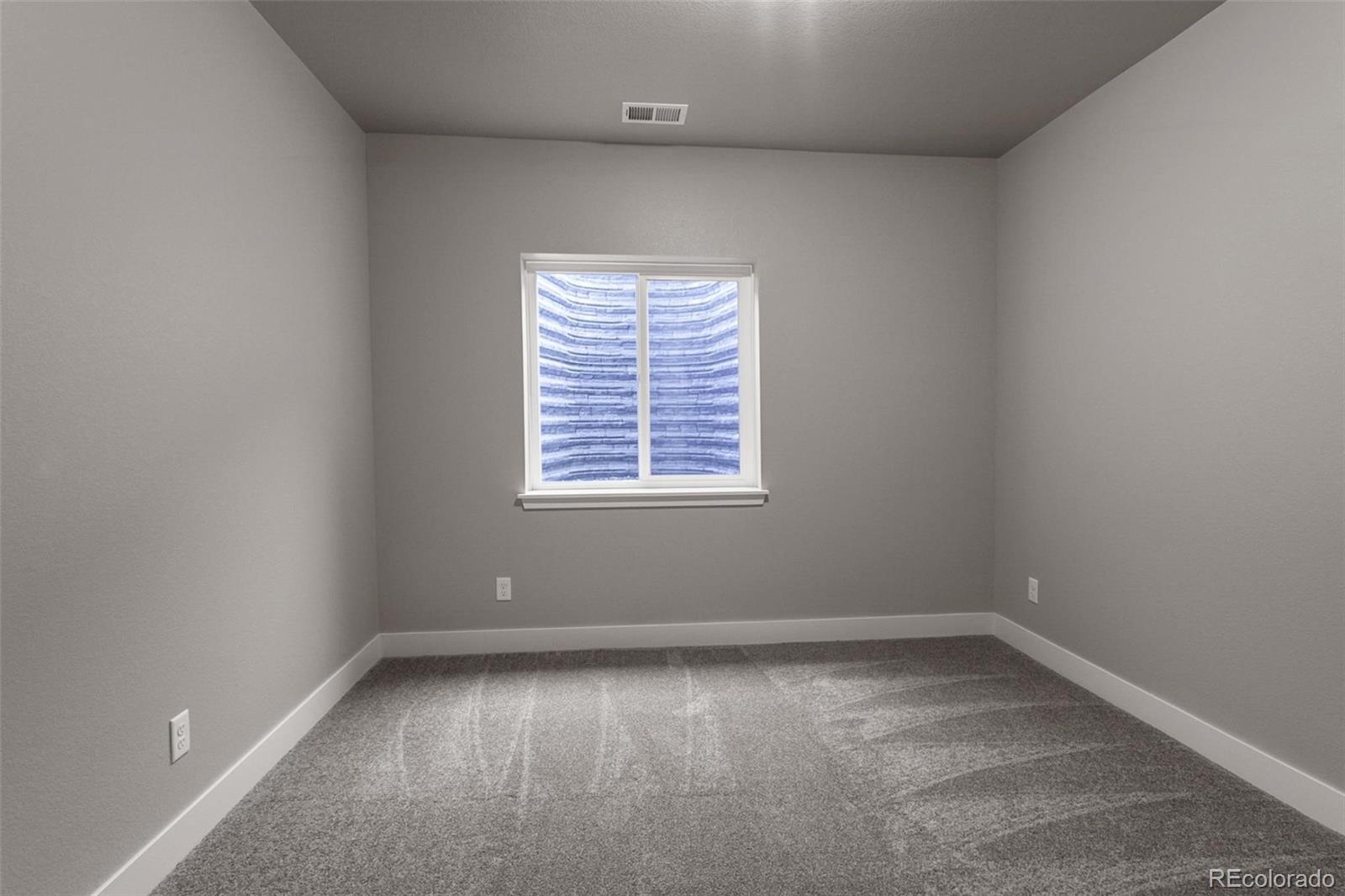 6768 Castello Street Timnath, CO 80547 - Photo 12 of 38 an empty room with a window