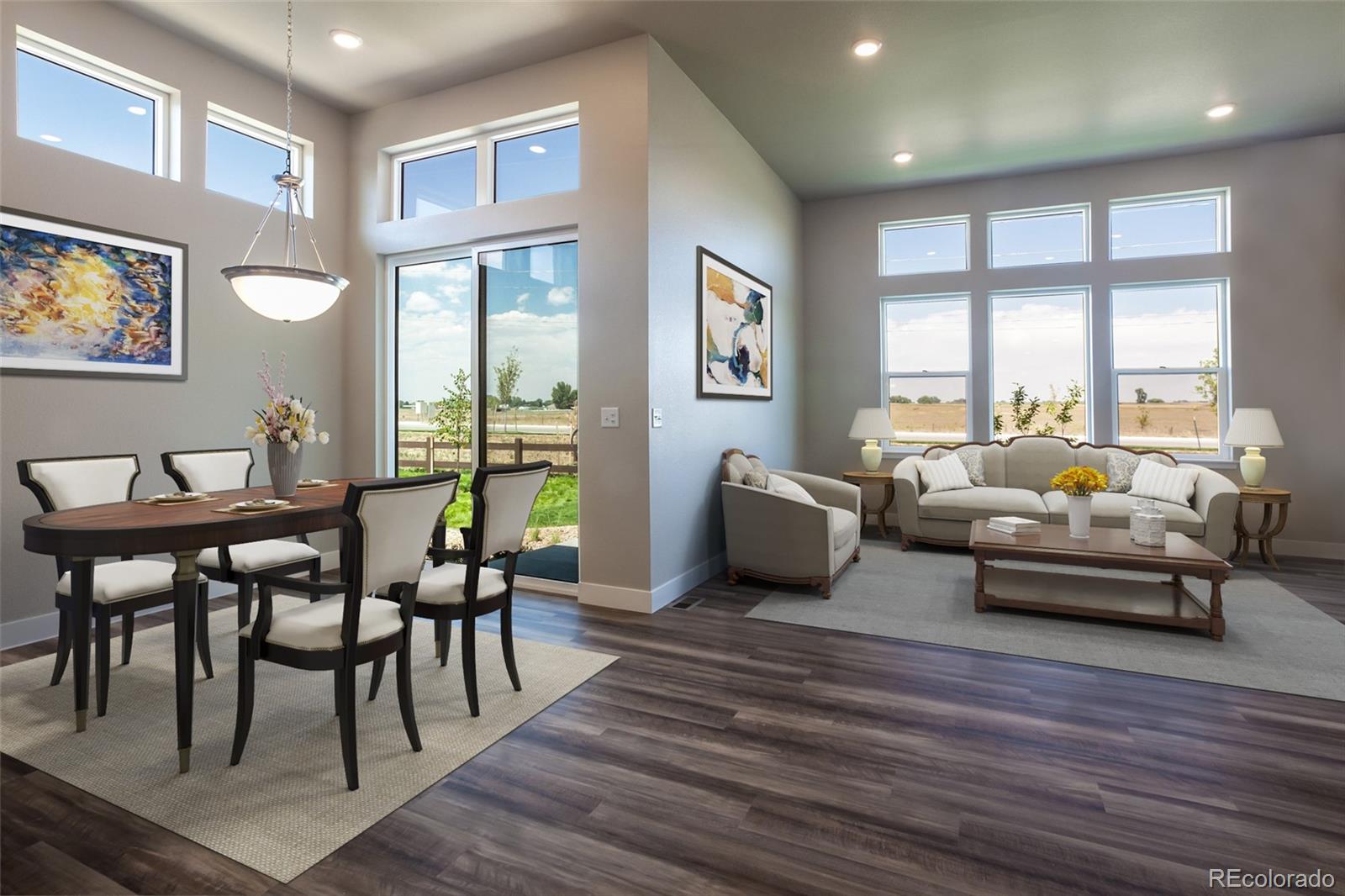 6768 Castello Street Timnath, CO 80547 - Photo 2 of 38 a living room with furniture and a wooden floor