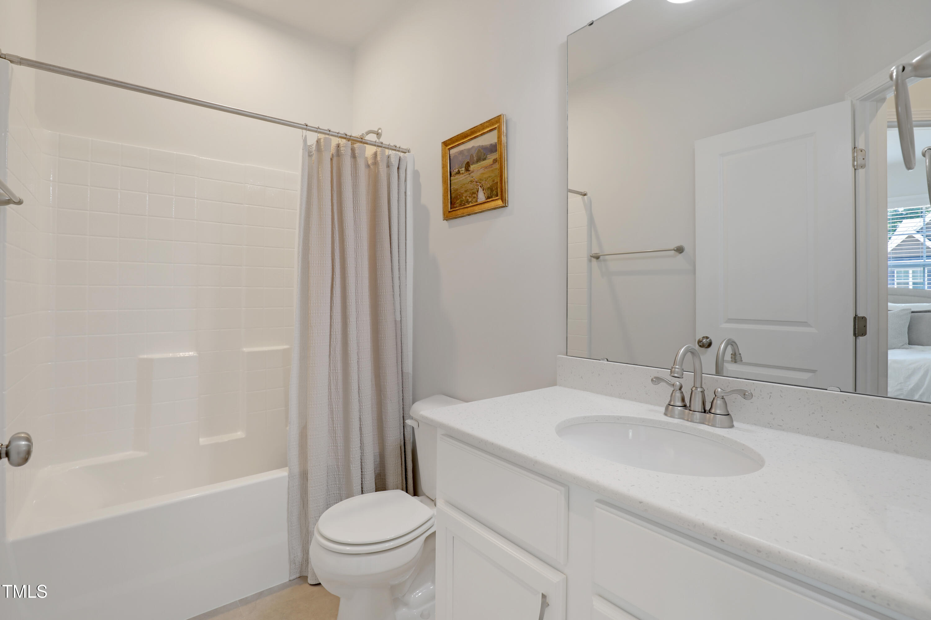3636 Water Mist Lane Raleigh, NC 27604 - Photo 23 of 28 a bathroom with a sink toilet and shower