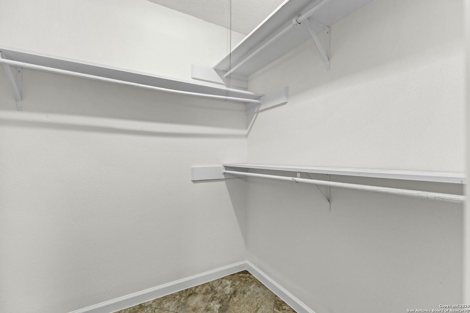 5346 Binz Engleman Road Kirby, TX 78219 - Photo 19 of 28 a view of small space with racks on the wall