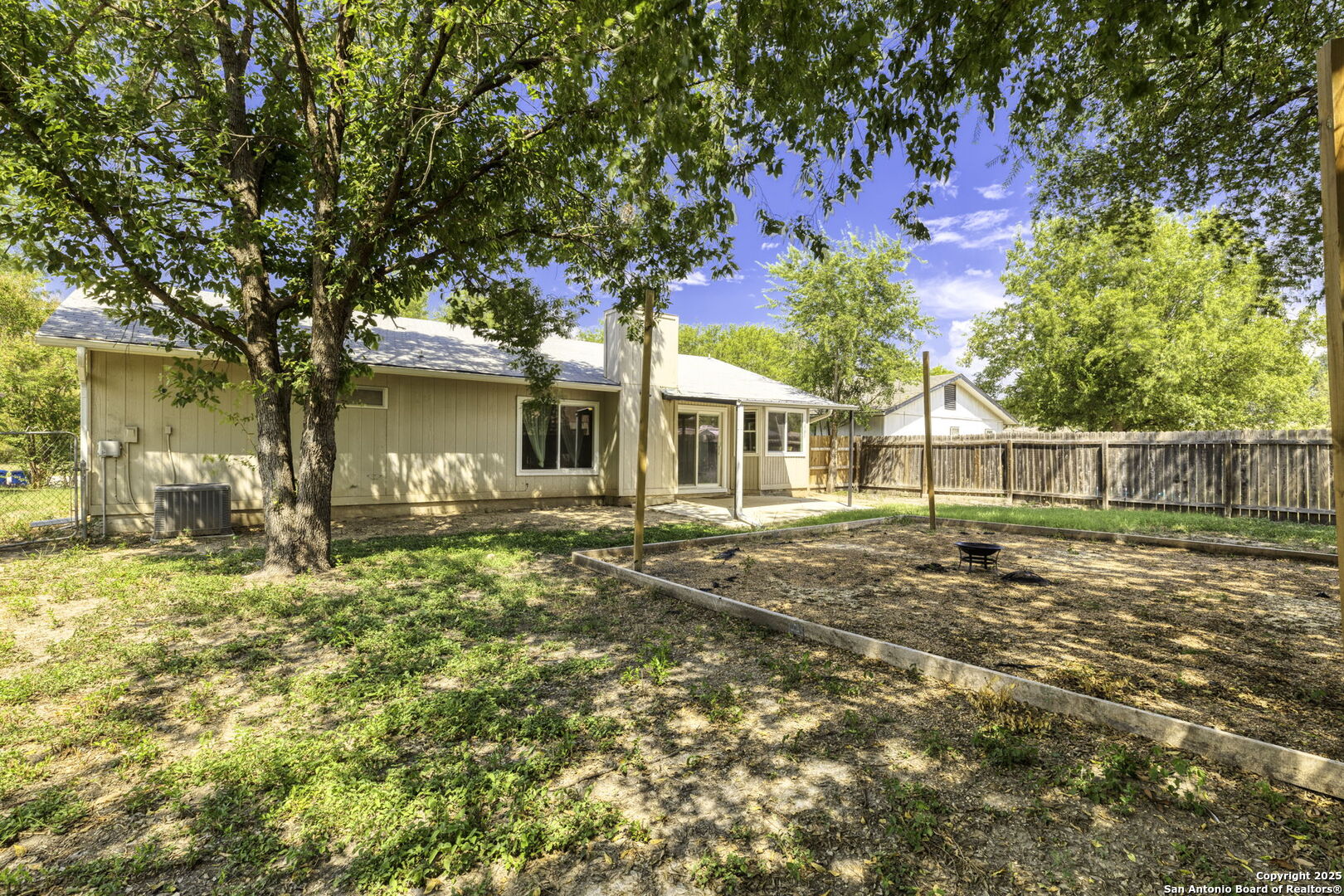 5346 Binz Engleman Road Kirby, TX 78219 - Photo 26 of 28 a front view of a house with a yard