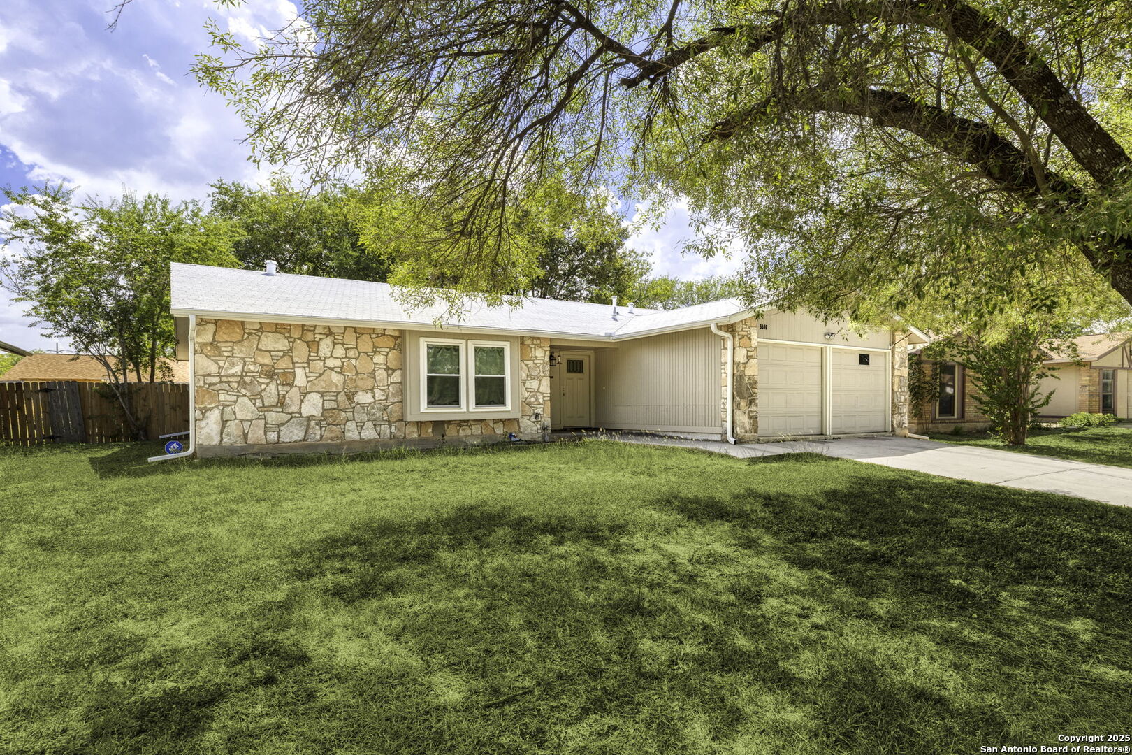 5346 Binz Engleman Road Kirby, TX 78219 - Photo 3 of 28 a view of a yard with a house and garden