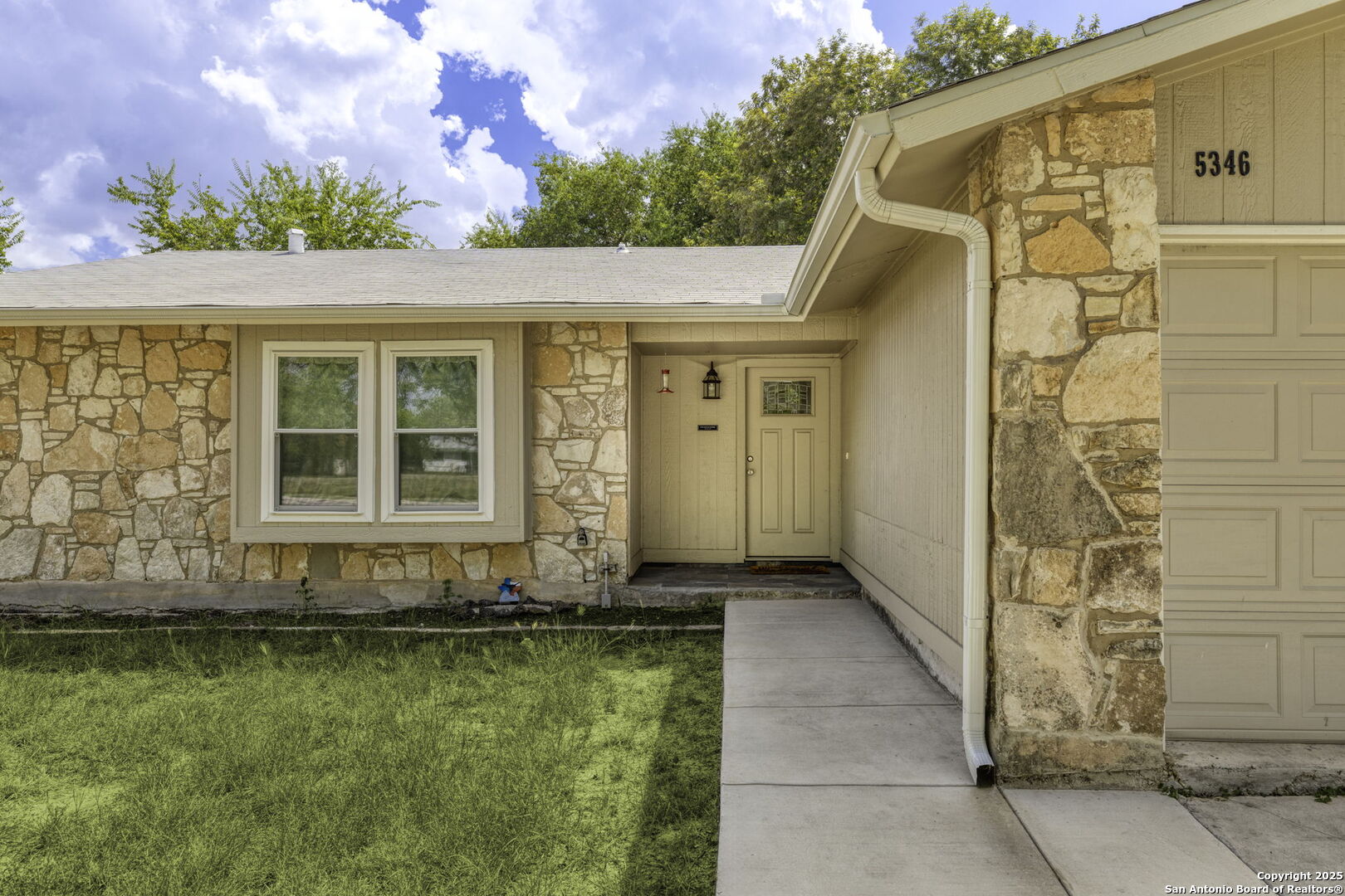5346 Binz Engleman Road Kirby, TX 78219 - Photo 4 of 28 a view of a house with a small yard