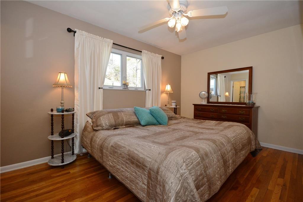 1346 Cathell Road Baldwin, PA 15236 - Photo 14 of 25 Neutral Master bedroom w/gleaming hardwood floors~