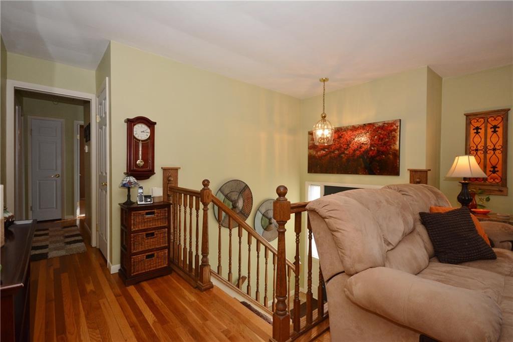 1346 Cathell Road Baldwin, PA 15236 - Photo 3 of 25 INVITING entry ~ Hallway has hardwood flooring, pull down attic space