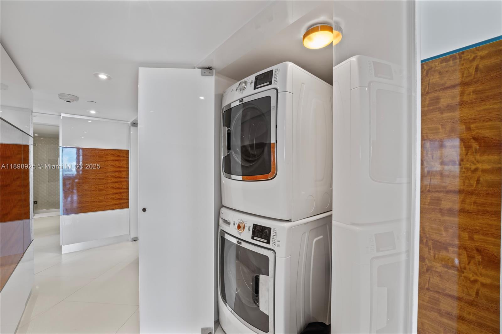 400 South Pointe Drive, Unit 910 Miami Beach, FL 33139 - Photo 21 of 44 a bathroom with a sink and a mirror