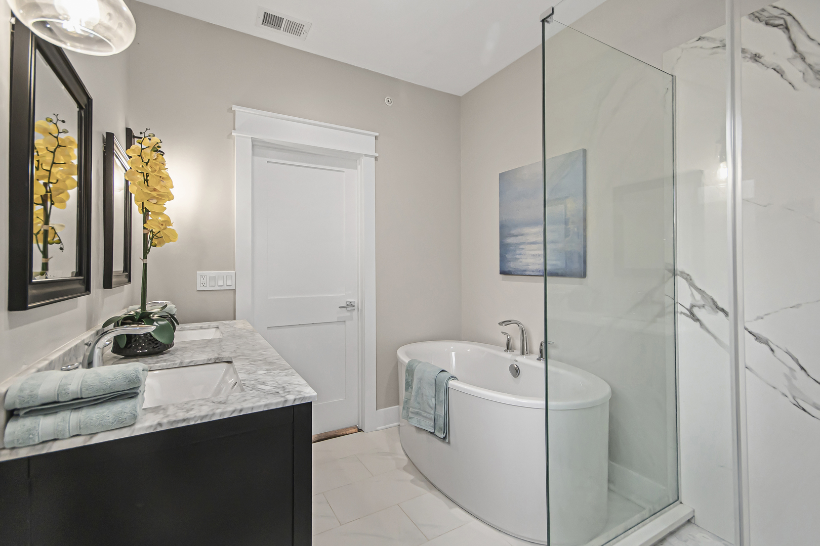 8146 Lincoln Avenue Skokie, IL 60077 - Photo 14 of 25 a bathroom with a granite countertop sink and a mirror