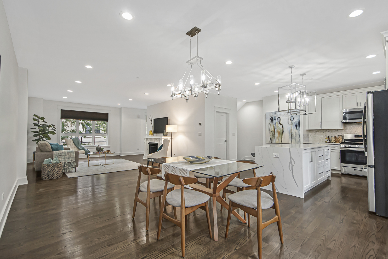 8146 Lincoln Avenue Skokie, IL 60077 - Photo 5 of 25 a view of a dining room with furniture and wooden floor