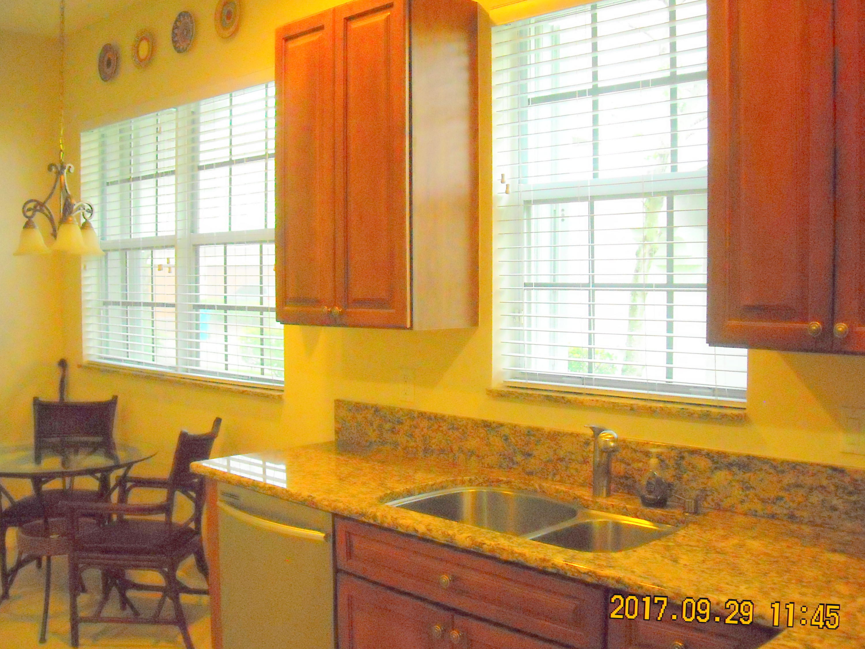 41 Lancaster Road Boynton Beach, FL 33426 - Photo 5 of 32 a bathroom with a sink and a bathtub