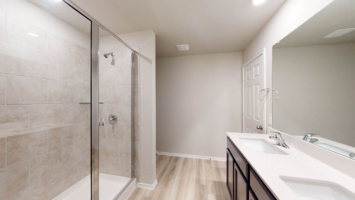 561 Hector Loop Georgetown, TX 78626 - Photo 18 of 30 a bathroom with a sink and mirror