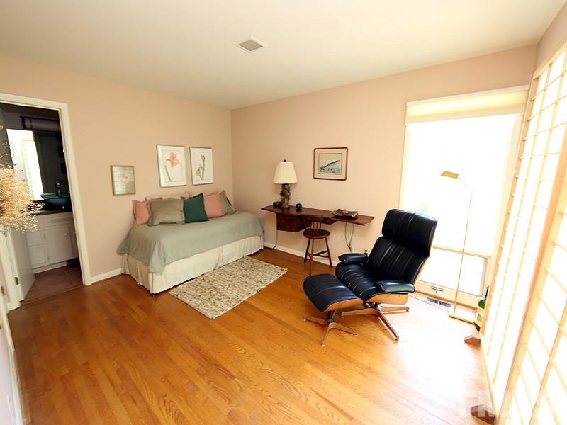 9620 Barton Creek Road Raleigh, NC 27615 - Photo 12 of 23 a living room with furniture and a flat screen tv