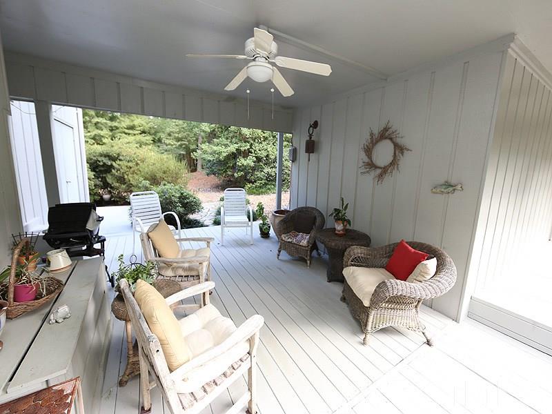 9620 Barton Creek Road Raleigh, NC 27615 - Photo 23 of 23 a living room filled with furniture and a large window