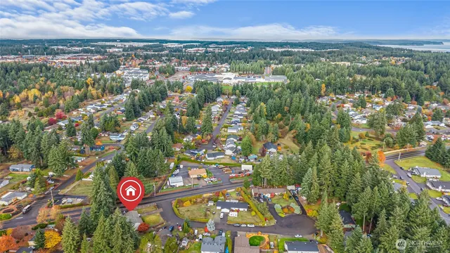 an aerial view of residential building and trees