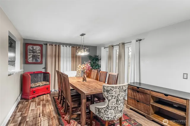 a view of washer and dryer with a bookshelf