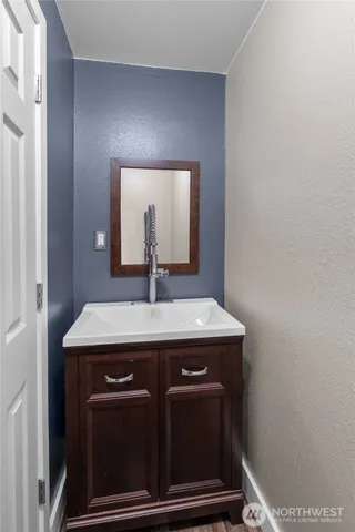 a view of kitchen with stainless steel appliances kitchen island
