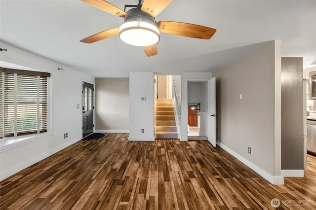 a view of an empty room with a window