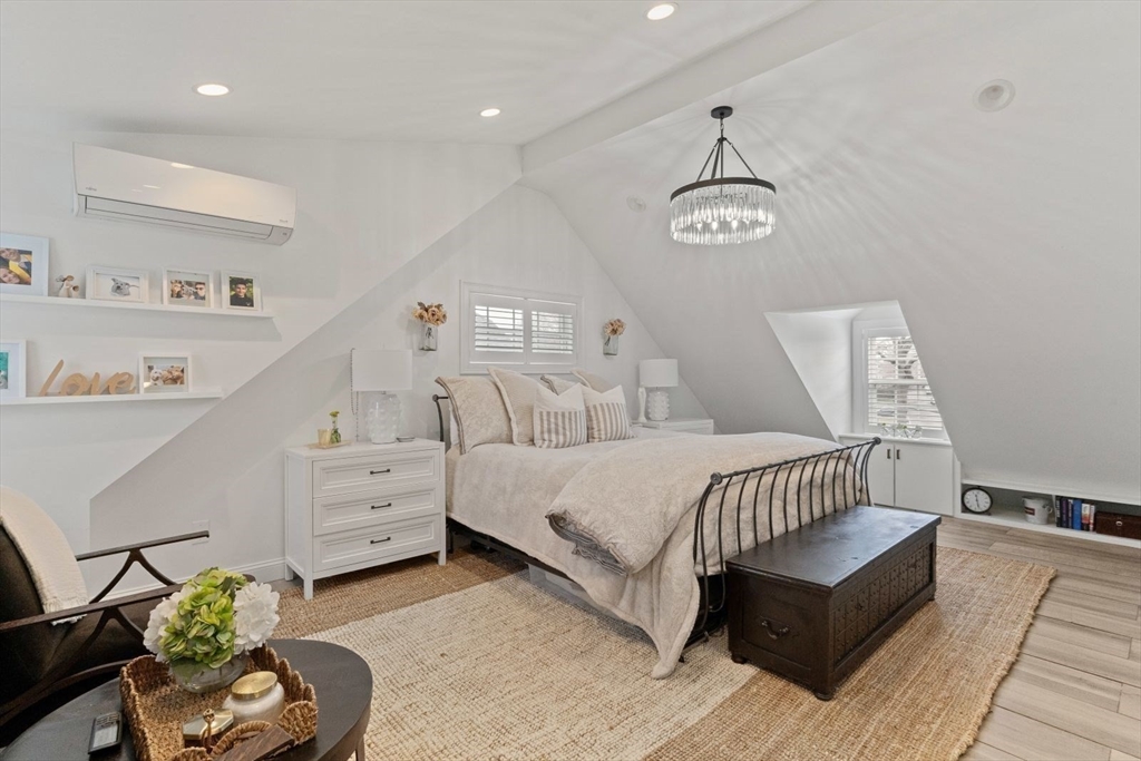 194 Merrymount Road Quincy, MA 02169 - Photo 13 of 32 a bedroom with bed and windows