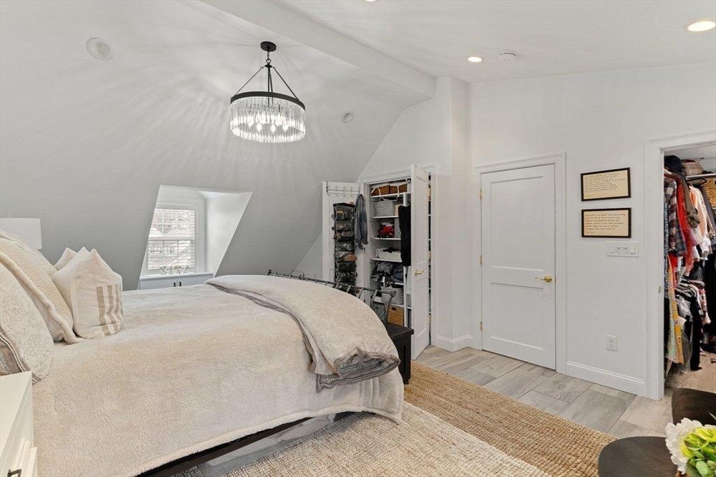 194 Merrymount Road Quincy, MA 02169 - Photo 15 of 32 a bedroom with a bed and a window