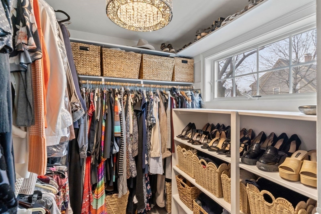 194 Merrymount Road Quincy, MA 02169 - Photo 16 of 32 a view of walk in closet with clothes