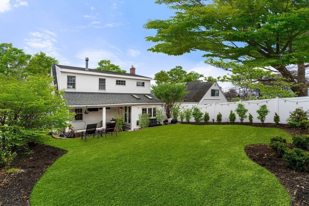 194 Merrymount Road Quincy, MA 02169 - Photo 27 of 32 a front view of a house with garden