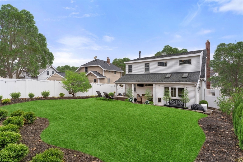 194 Merrymount Road Quincy, MA 02169 - Photo 29 of 32 a front view of a house with a garden