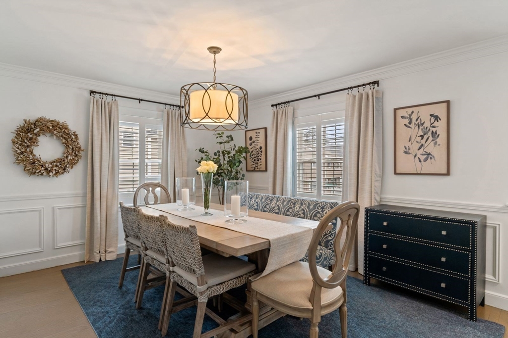 194 Merrymount Road Quincy, MA 02169 - Photo 5 of 32 a view of a dining room with furniture window and wooden floor